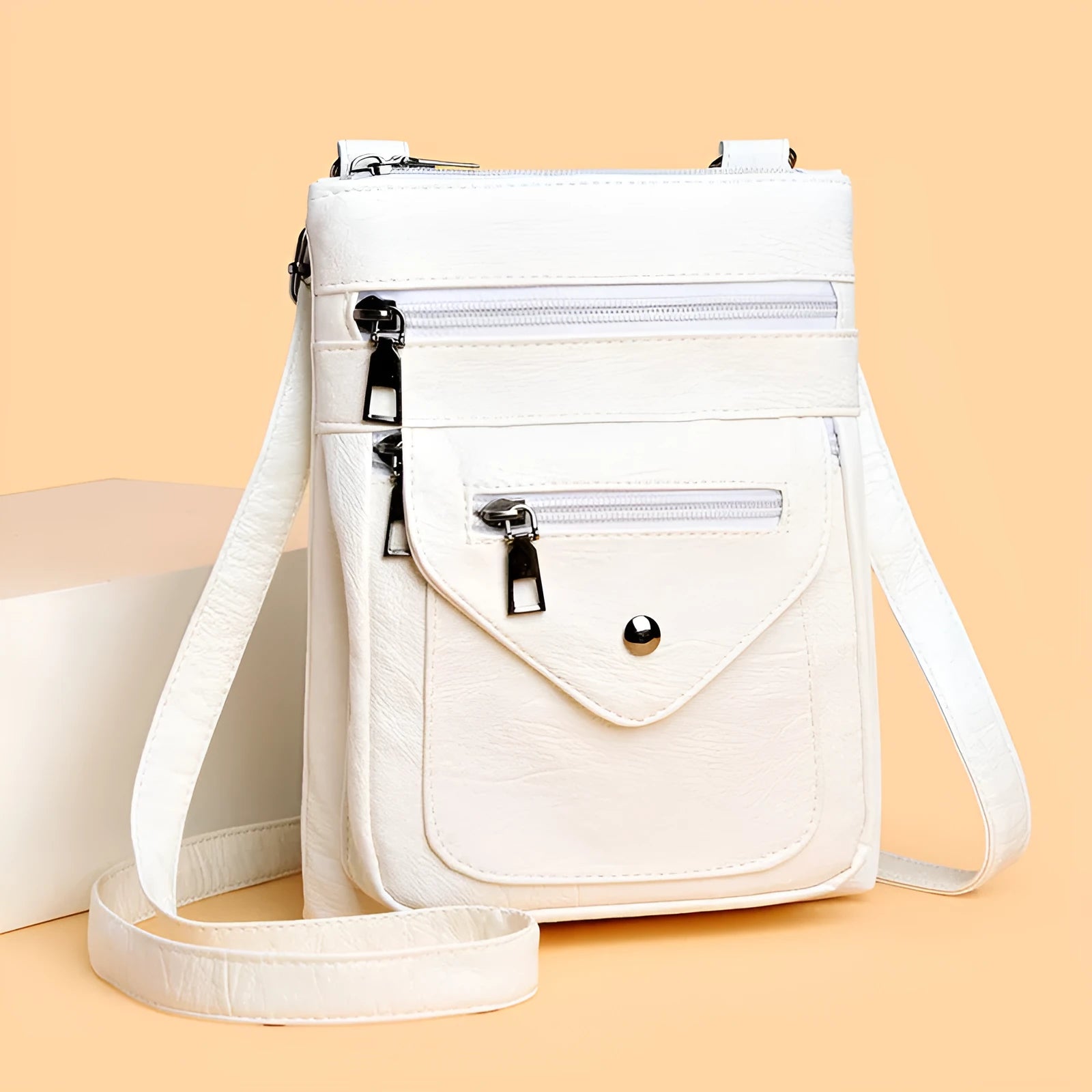 Vertical square-shaped crossbody phone bag in PU leather available in four colours