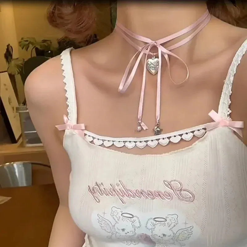 Silver-tone women's necklace with a ribbon love pendant on a delicate clavicle chain.