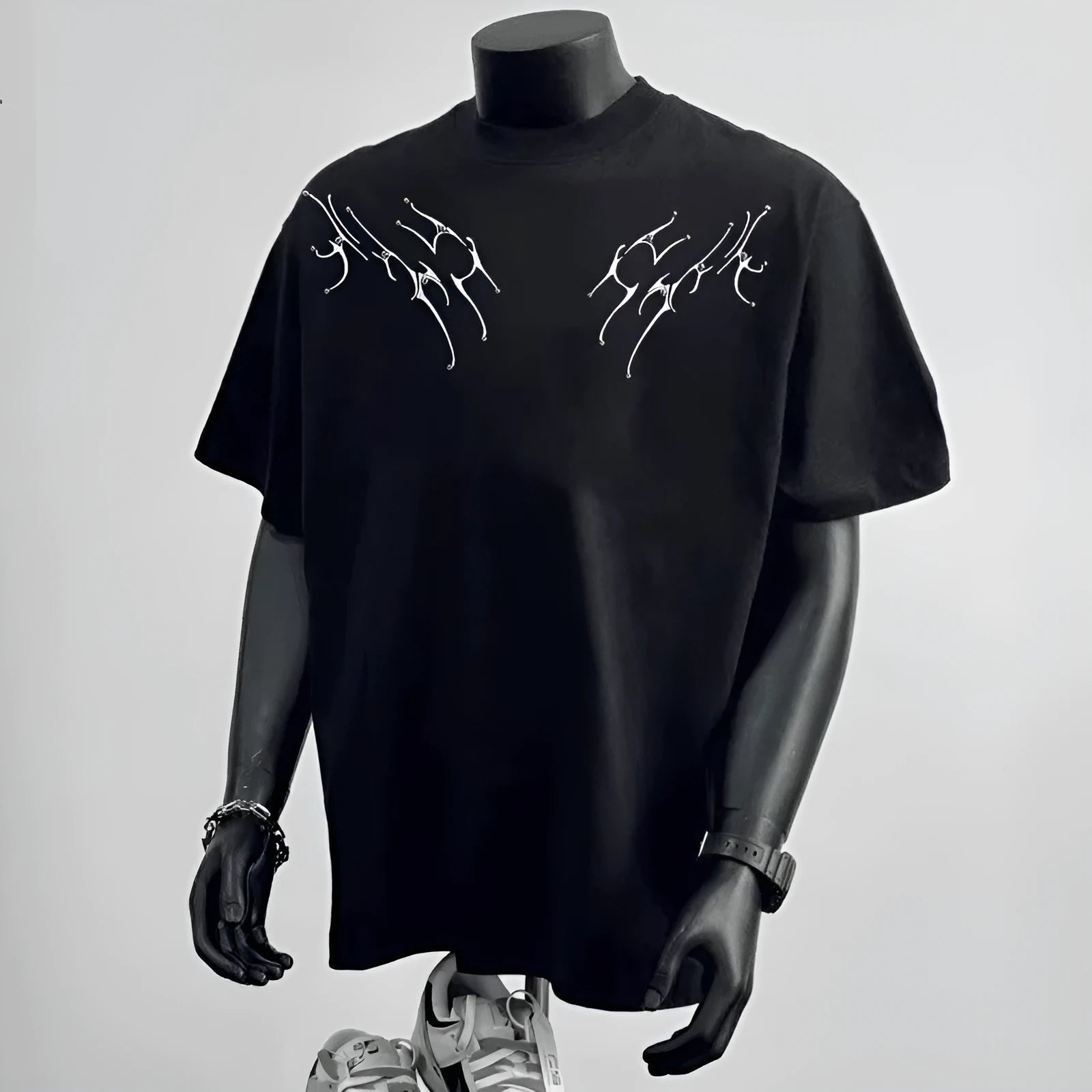 Men's loose fit pure cotton short sleeve shirt in black, showing printed design.