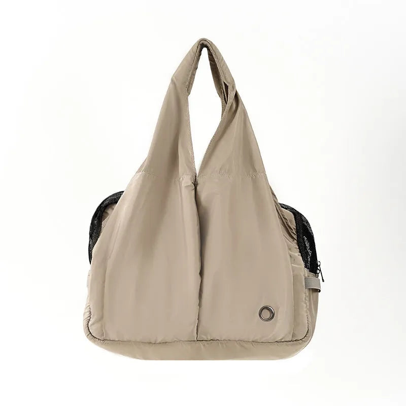 Apricot-coloured cloth pet carrier handbag for small dogs and cats showing medium size