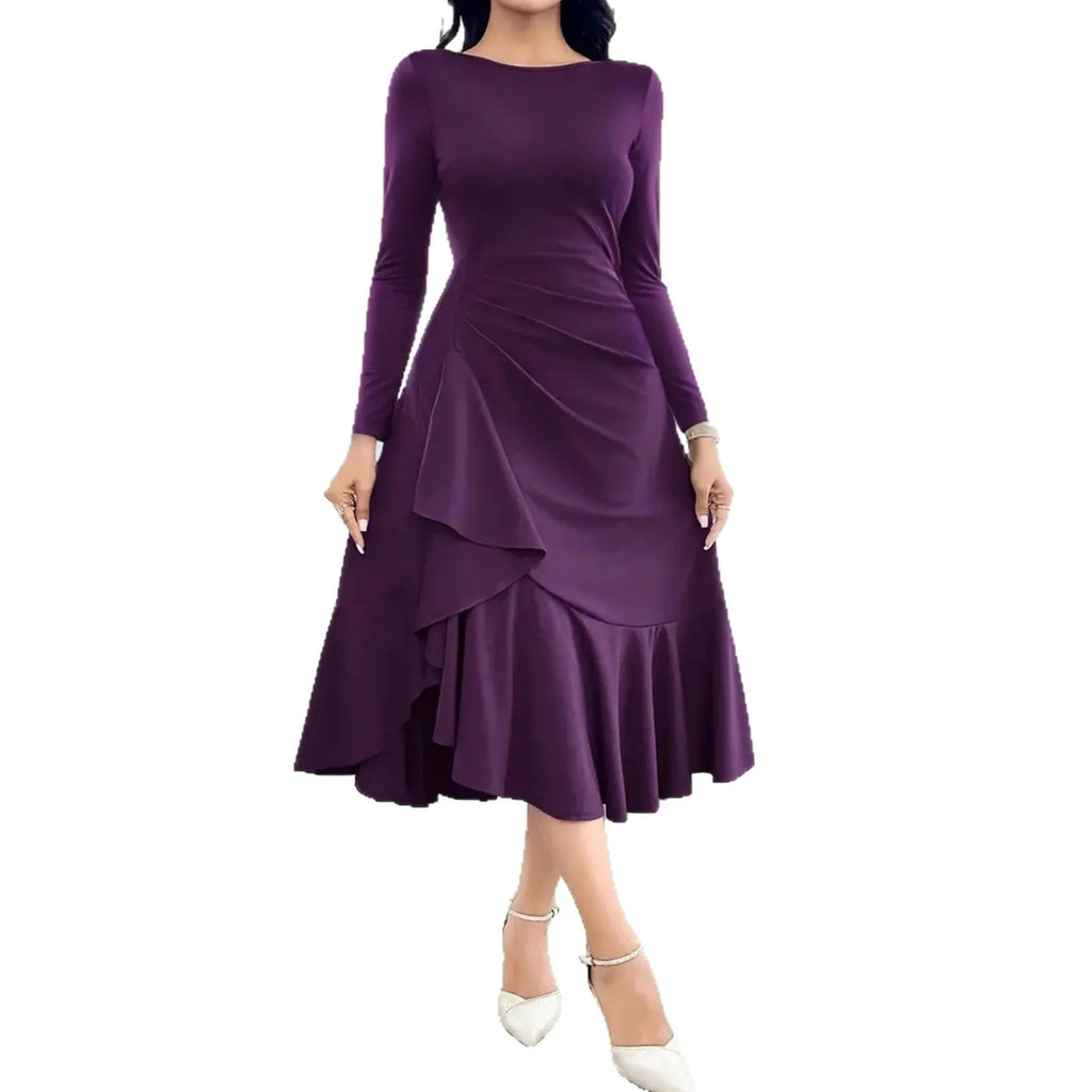 Purple women's long sleeve dress with ruffle detail and a round neck, shown on a model.