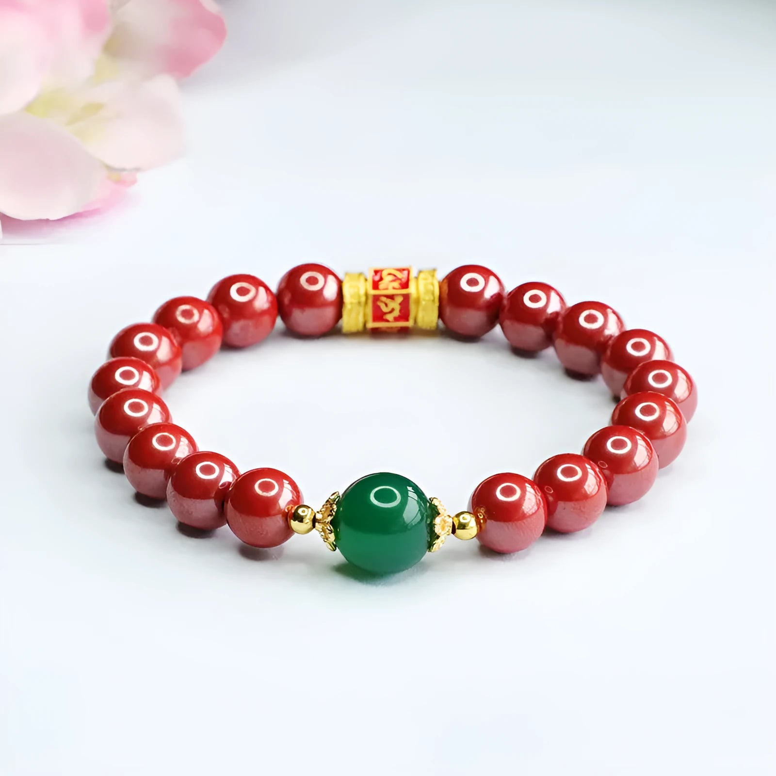 Emperor Sandstone colour cinnabar bracelet with 8mm beads and a six words motto charm.