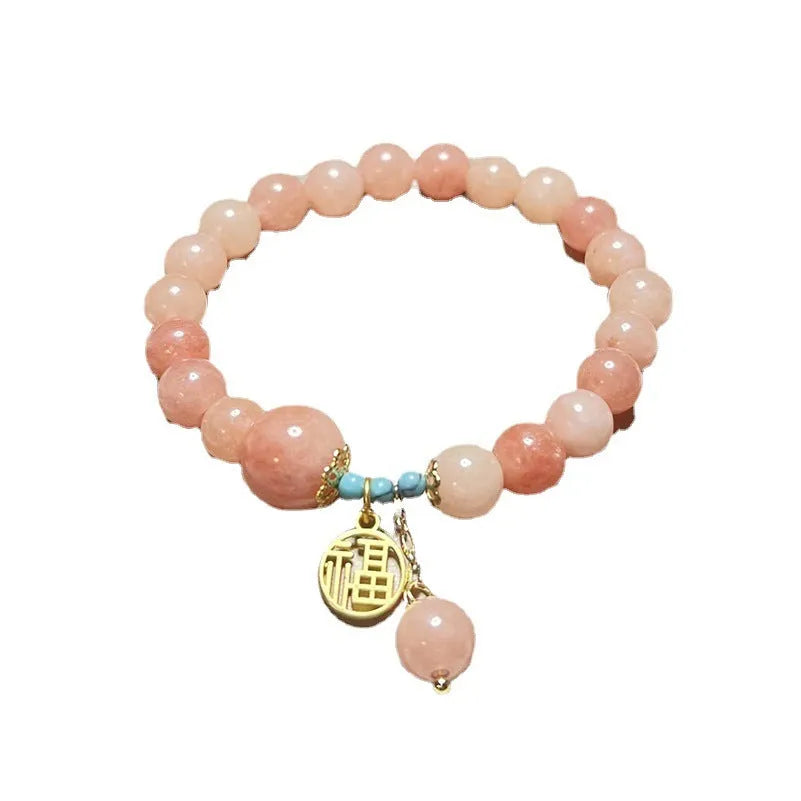 Pink natural stone bracelet on adjustable alloy chain for women, simple jewellery design
