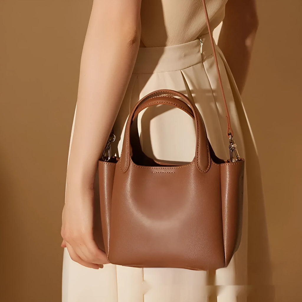 Brown genuine cattlehide leather cross body bucket bag with retro style and single shoulder strap
