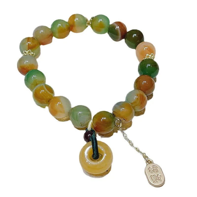 Yellow Lutong agate bracelet with peacock agate and topaz elements, peace buckle clasp, 1cm width women's jewellery