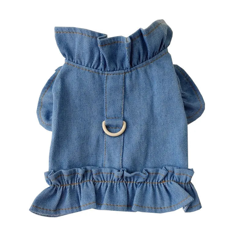 Blue denim dog dress with ruffles vest detail and a metal leash hook on the chest.