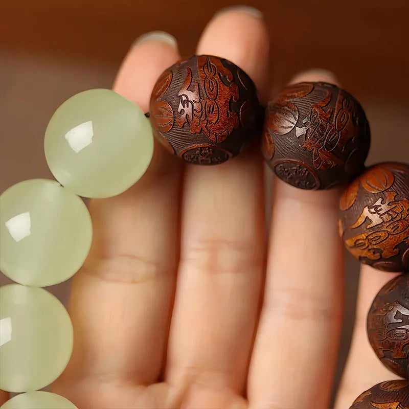 Rosewood bracelet with amass fortunes fu character carving and 20mm wooden beads