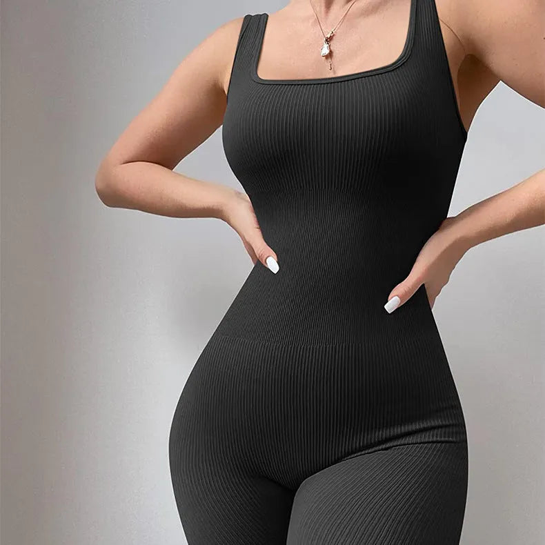 Women's long sleeve spandex suspender tank top tights with button details on a mannequin.
