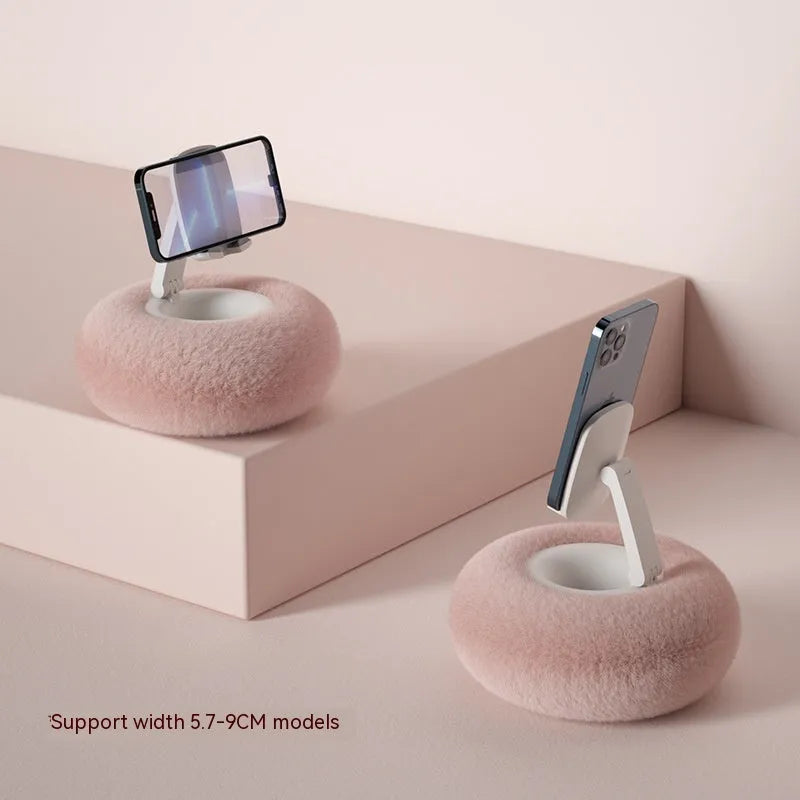 Rotating phone and tablet bracket with adjustable clamp extended vertically on desk