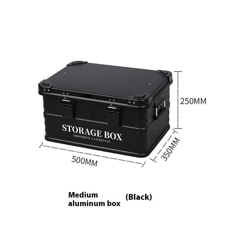 Army green waterproof plastic storage box sitting in a car boot