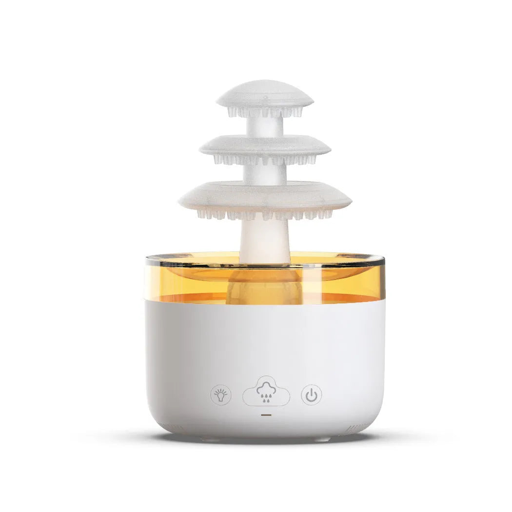 White Cloud Rain ultrasonic humidifier and essential oil diffuser with coloured LED lights on a table.
