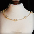Gold alloy butterfly pendant necklace with zircon stones on adjustable chain from 21 to 50cm