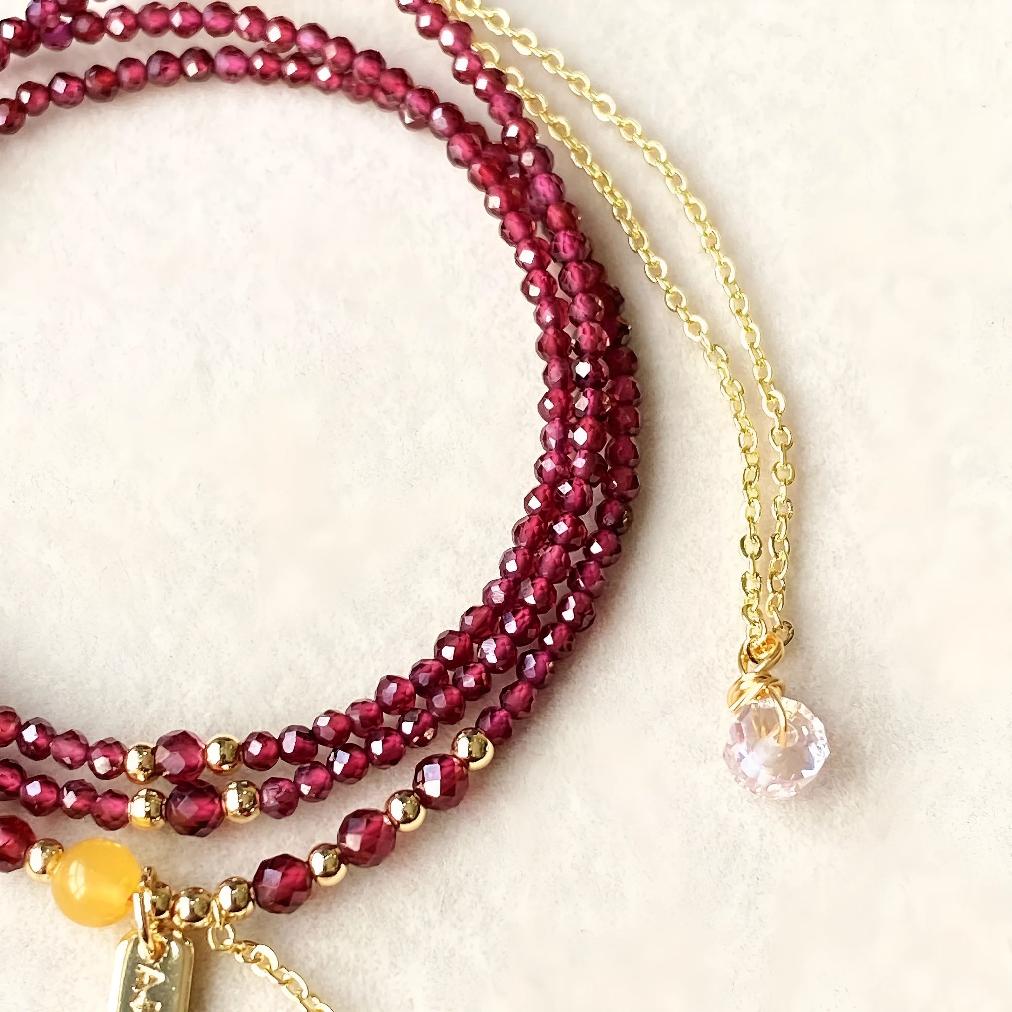 Wine red garnet bracelet necklace with three-circle design and beeswax cut surface texture
