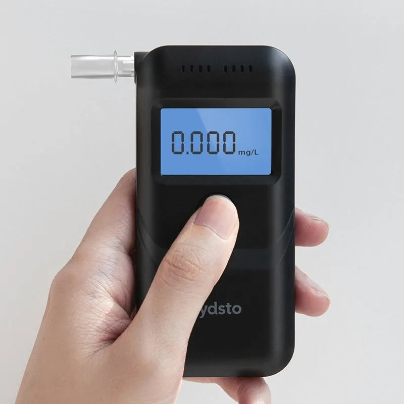 Black portable alcohol breath tester for household drunk driving detection