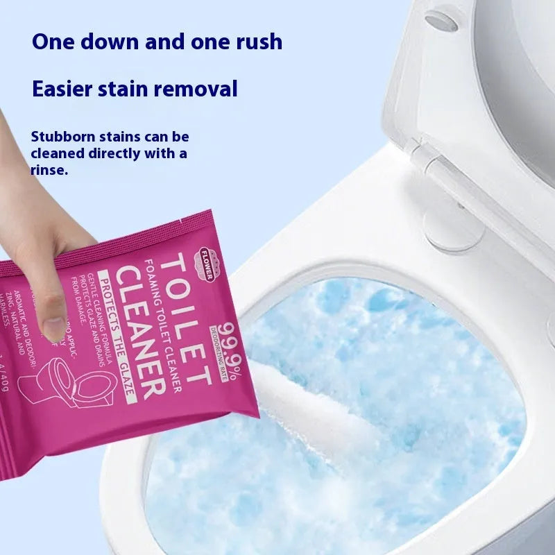 Toilet bubble cleaning powder package in blue or pink fragrance variant, showing 240g bag or box of 5 sachets.