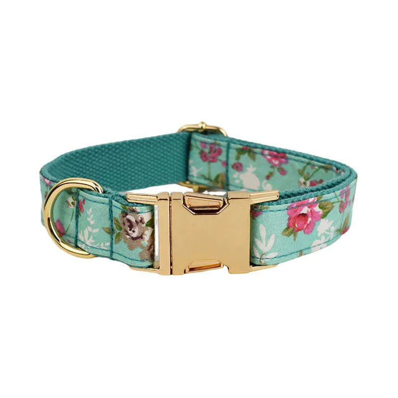Rose pattern fabric dog collar set with green background, matching leash, detachable bow and coordinating dog vest