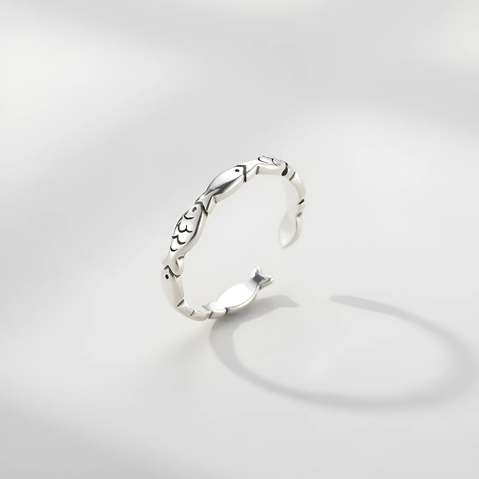 Adjustable sterling silver fish ring with open mouth design and electroplated finish