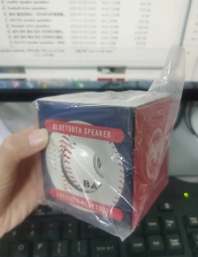 Baseball home shaped Bluetooth speaker in green colour showing front design with speaker grille