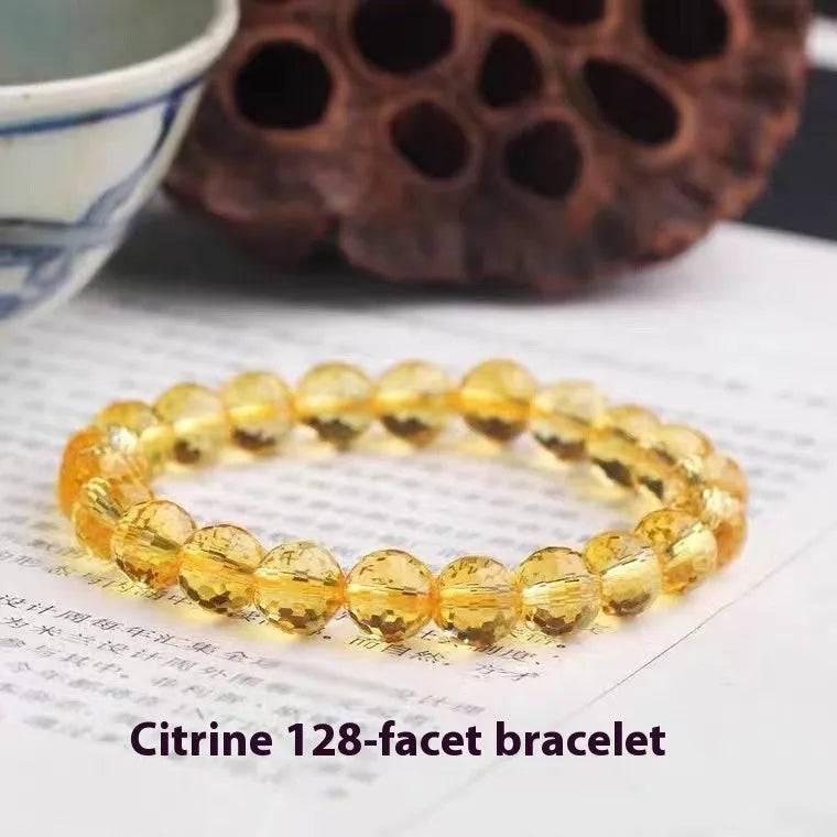 Handmade unisex bracelet with 128-faceted crystal beads and a decorative charm, available in multiple bead sizes.