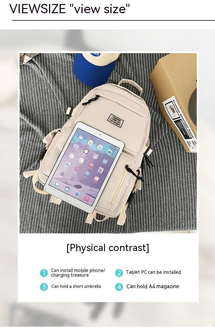 Black or white nylon student backpack with computer compartment and three-dimensional pockets