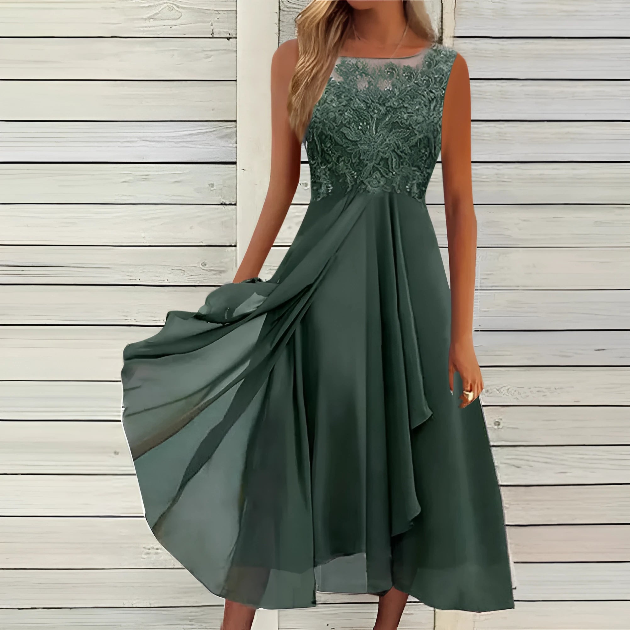Women's sleeveless chiffon dress with lace hollow-out stitching in green, shown in a mid-length princess style.