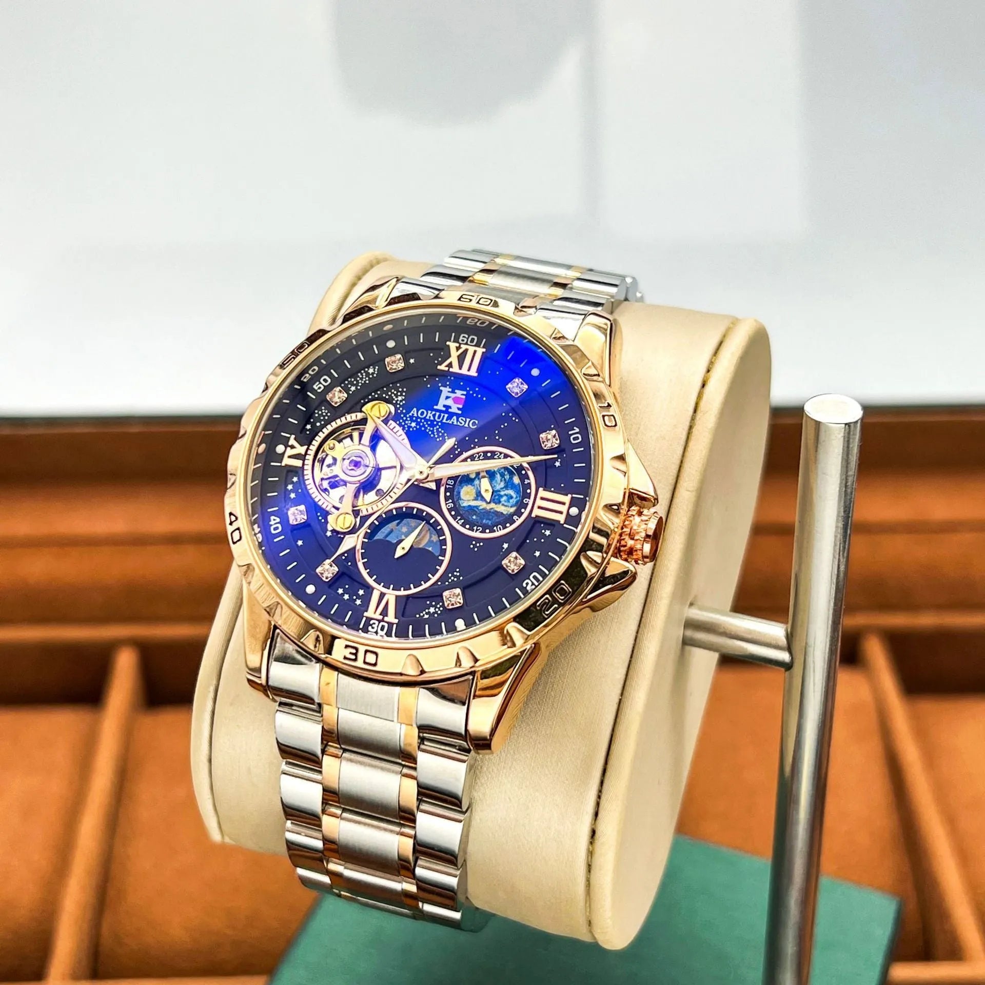 Men's rose gold automatic mechanical watch with black dial and stainless steel strap