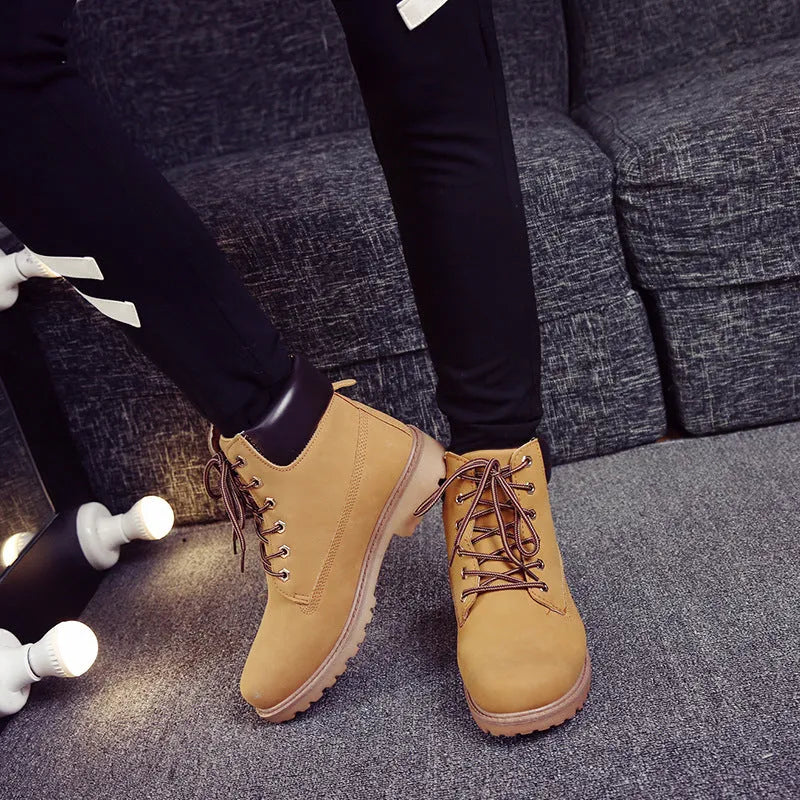 Men's pink high-top Martin boots with front lace-up and round toe design