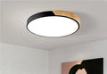 30cm round plastic LED ceiling light with remote control, shown in a white finish.