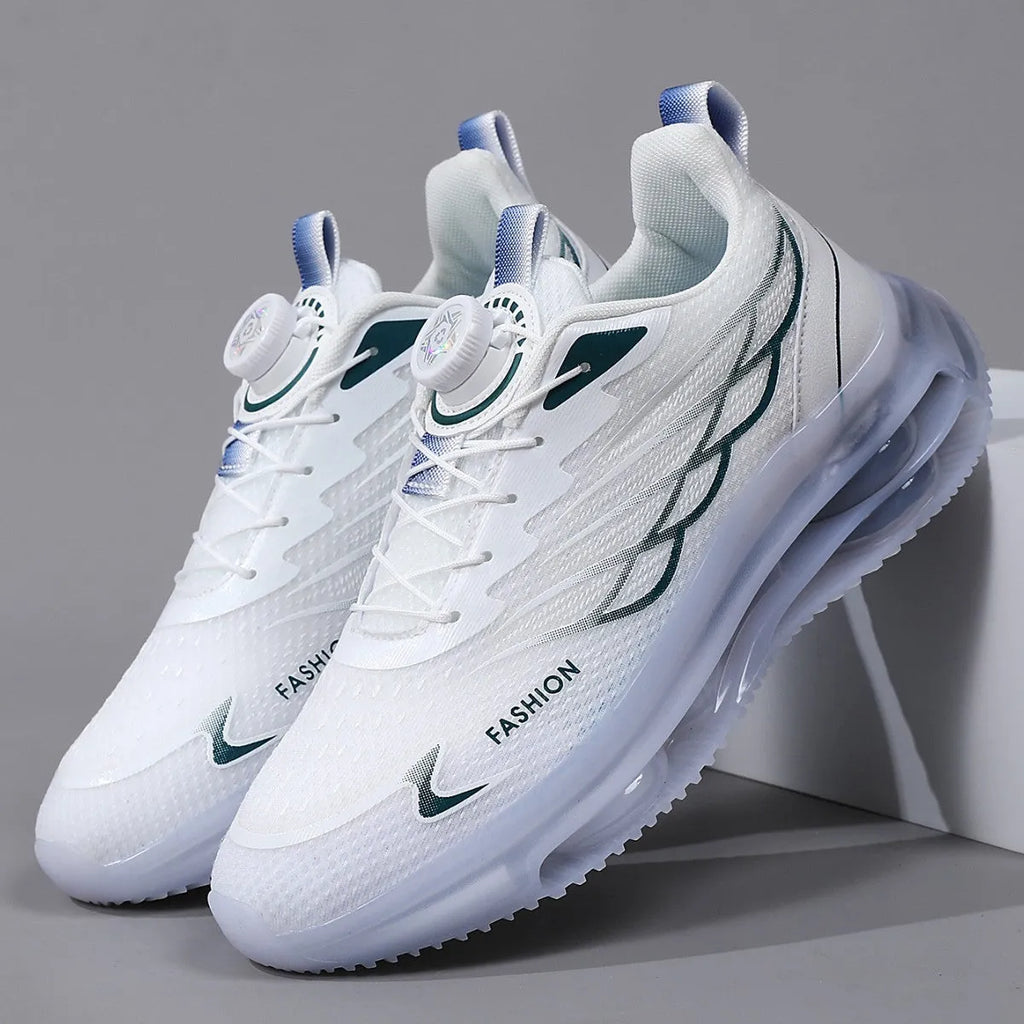 White men's casual running shoes with a rotating button closure and mesh upper on a flat rubber sole.