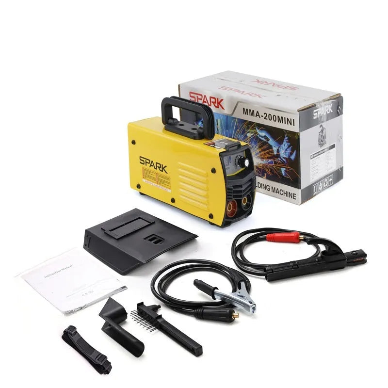 MMA-200MIN compact inverter DC welding machine with welding tongs, grounding clamp, and face shield on a workbench.