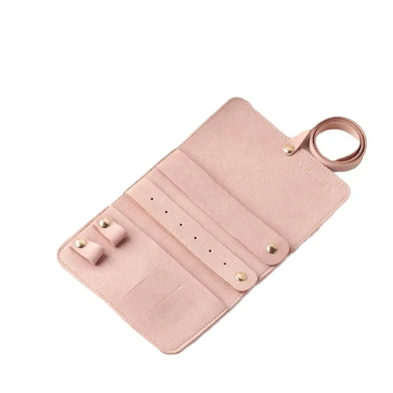 Brown soft microfiber PU leather jewelry storage bag measuring 12x12 cm for earrings and watches.