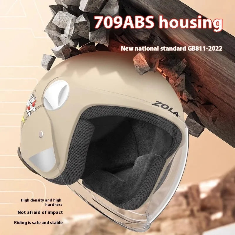 Winter cycling helmet with attached blue neck scarf and clear anti-fog visor on handlebars.