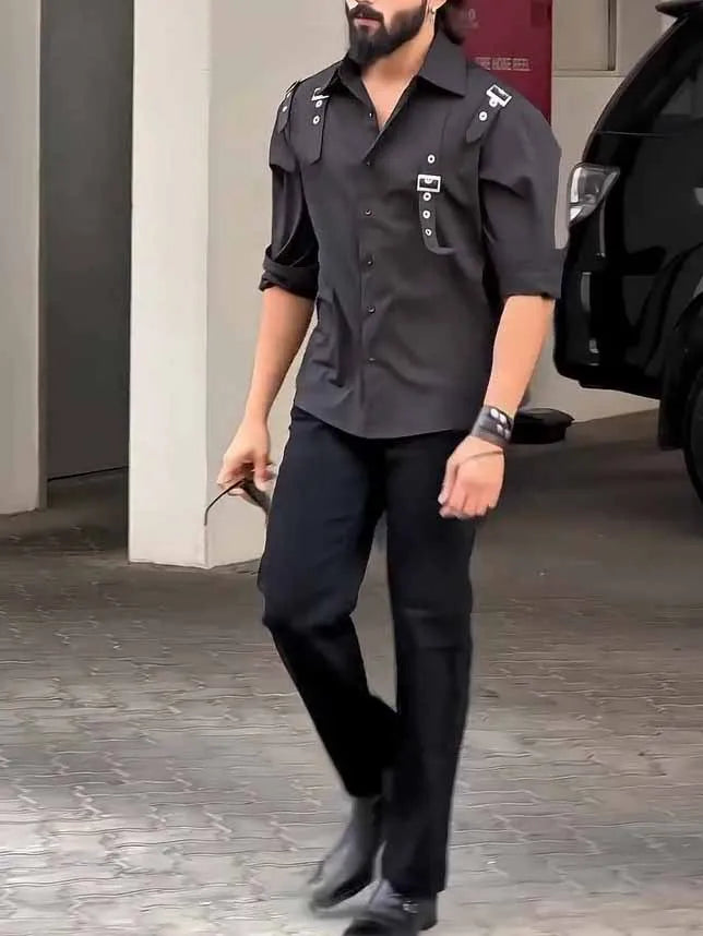 Men's black utility-style button-up shirt with a button-down collar on a hanger.