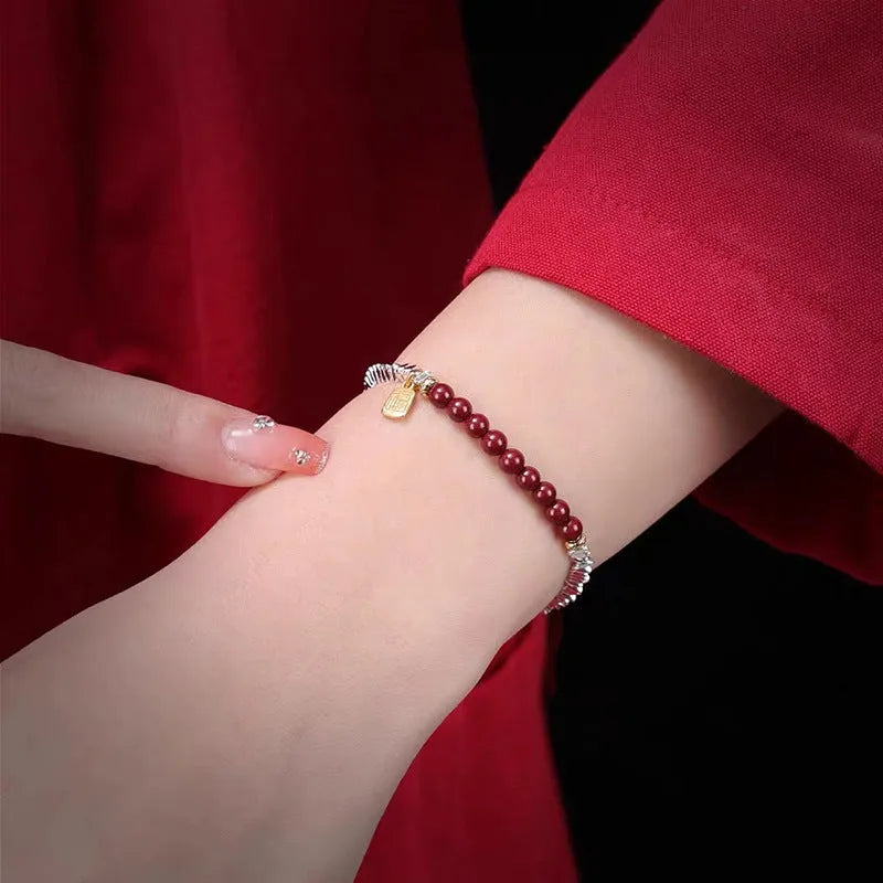 Silver electroplated couple bracelet with small geometric lucky beads measuring 16 cm