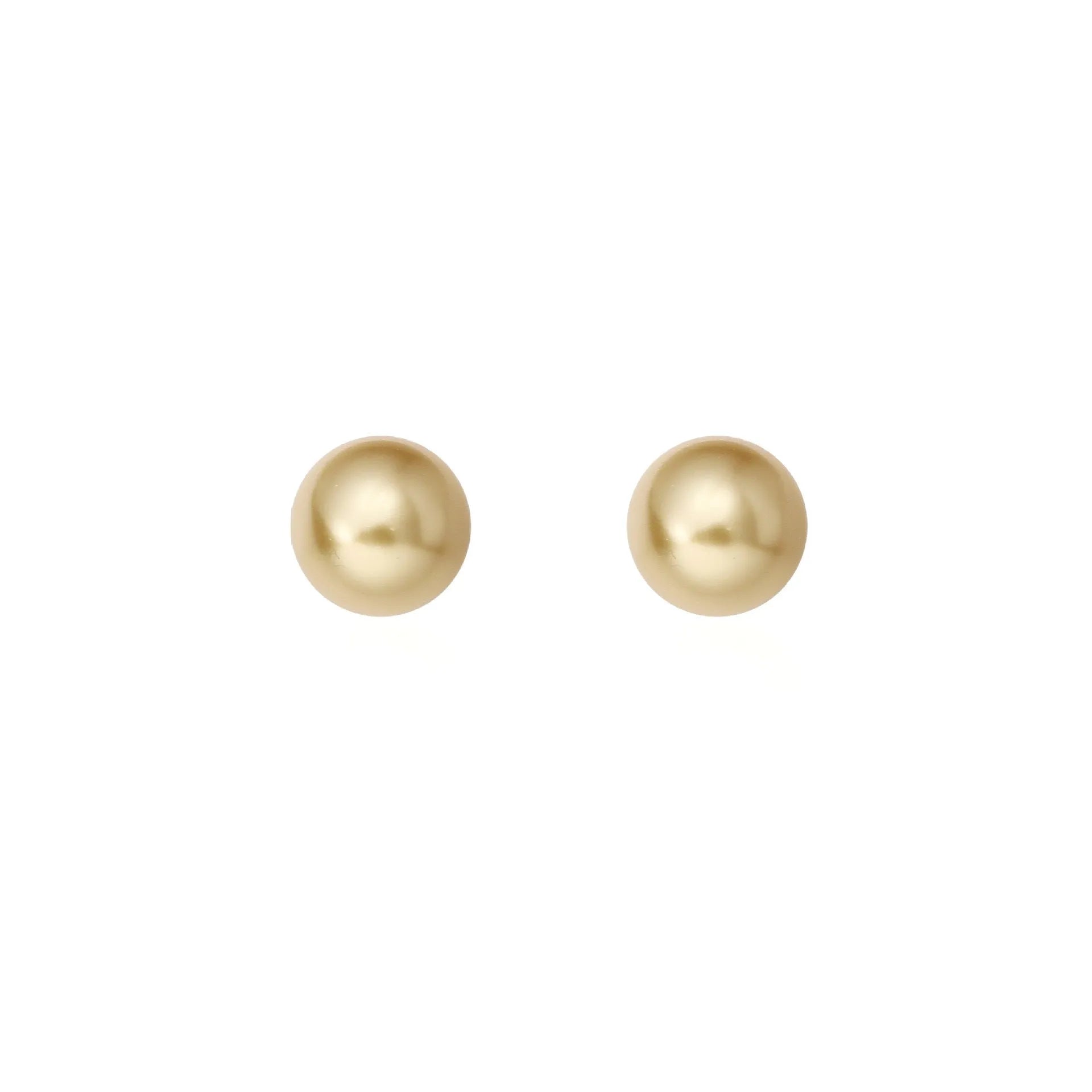 Close-up of a women's large pearl stud earring with an eight-point geometric silver star setting.