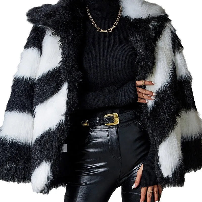 Women's faux fur coat with contrast lapel and detachable fur collar on a hanger.