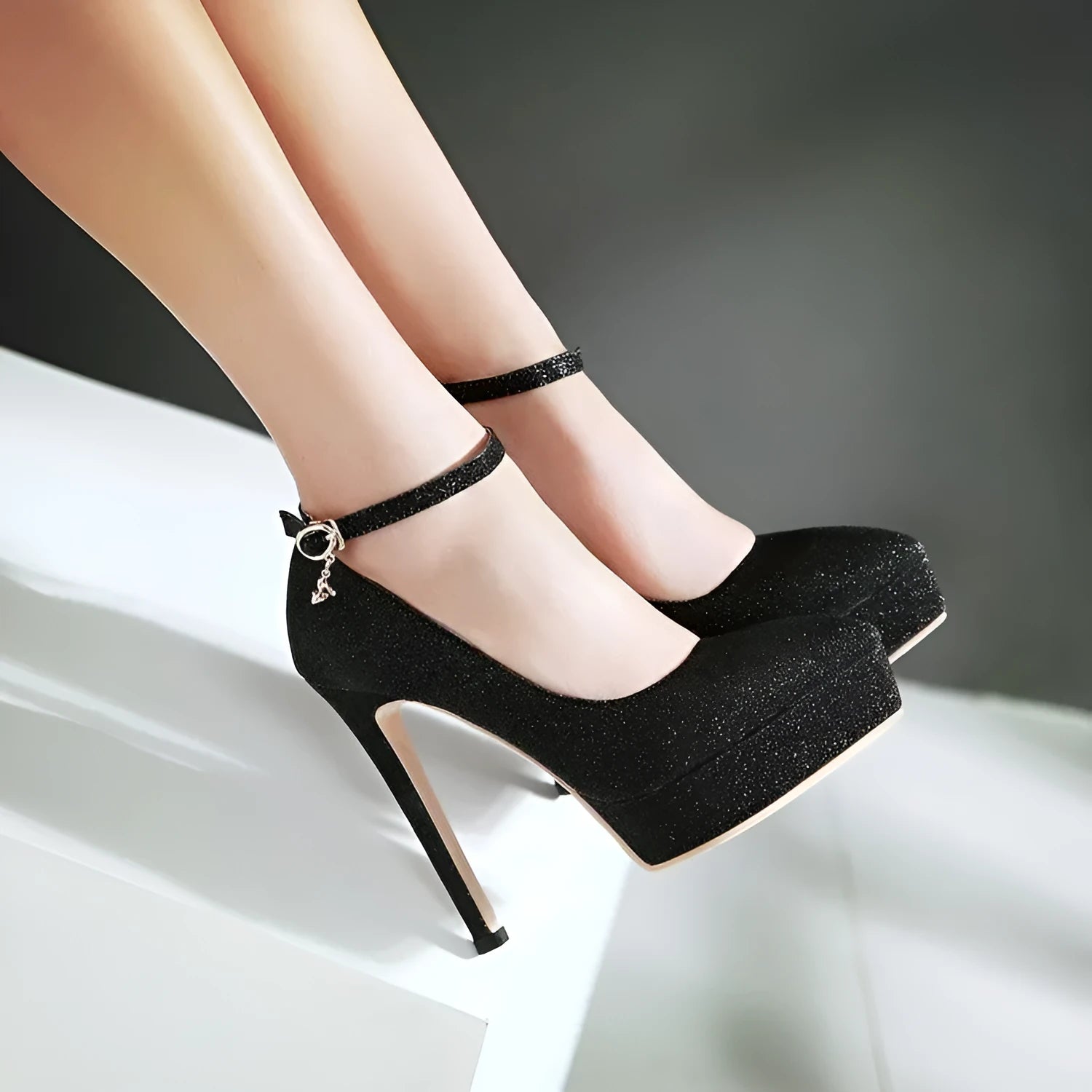 Women's waterproof platform stilettos in black with ankle bandage buckle and 13cm heel