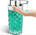 Silver automatic soap dispenser with sensor and USB Type-C charging port on a bathroom countertop