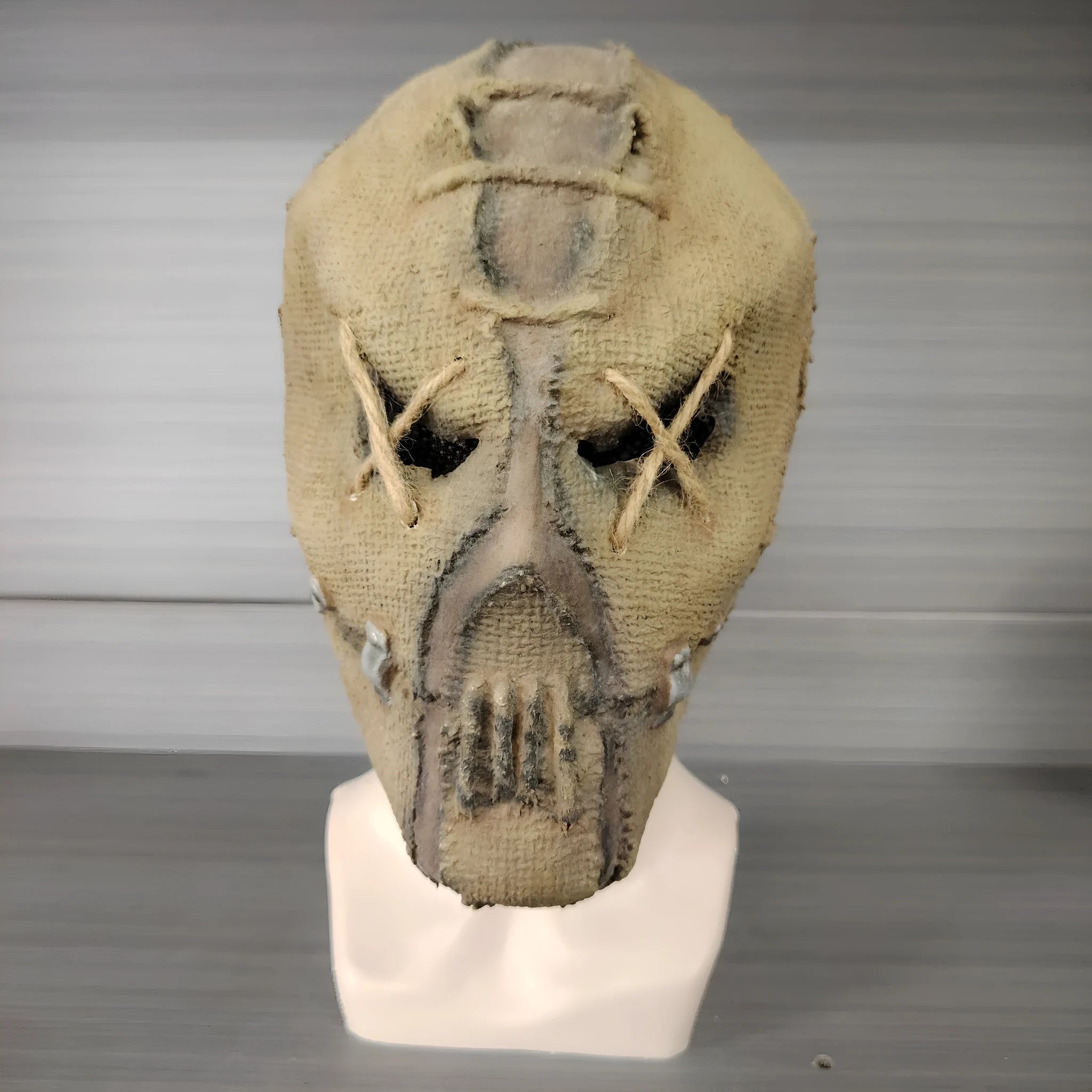 Latex Halloween horror mask showing detailed scar skull design as a full head cover.
