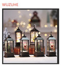Christmas simulation LED flame small oil lamp with decorative old man figure and tree on a shelf