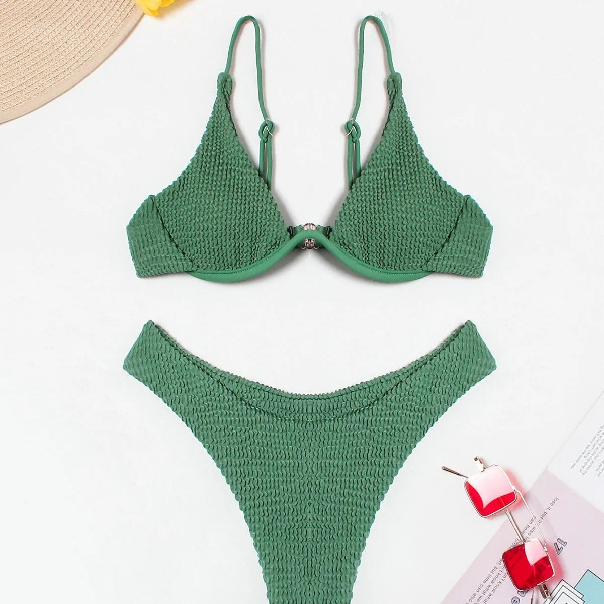 Women's green bikini swimsuit with ruffle trim top and split skirt bottom