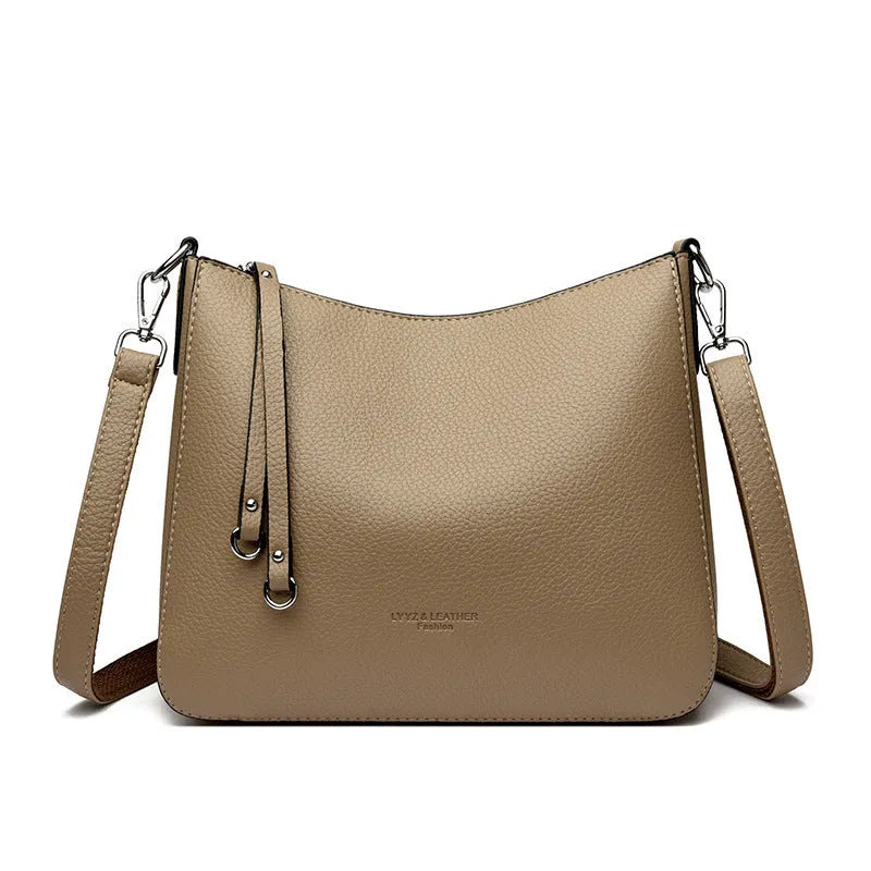 Genuine leather crossbody bag with metal belt decoration, horizontal square shape, available in khaki and other colours