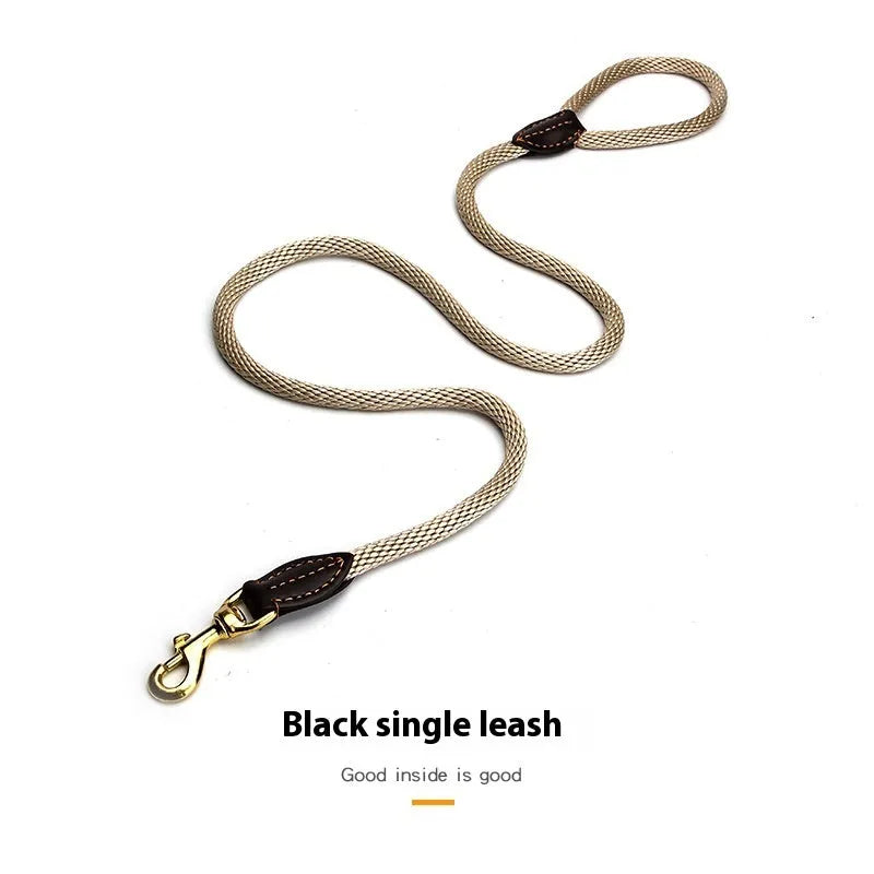 Nylon hand holding dog leash in black or brown with four diameter sizes for small to medium dogs.