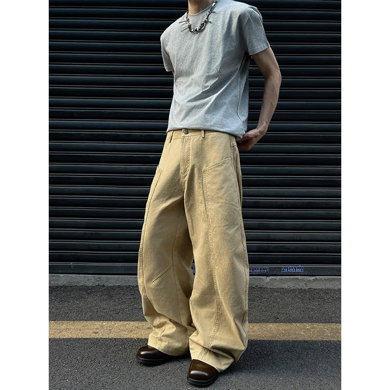 Men's khaki cotton straight-leg trousers laid flat showing American retro casual style