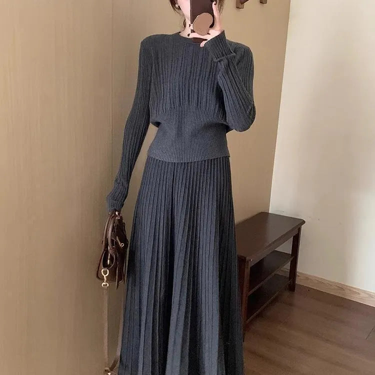 Women's dark grey knitted dress suit with 3D pattern, artistic retro style two-piece set.