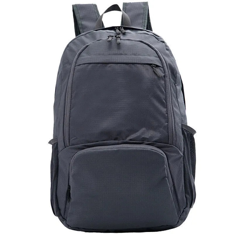 26-inch foldable waterproof backpack in Oxford cloth, shown in multiple colour options.