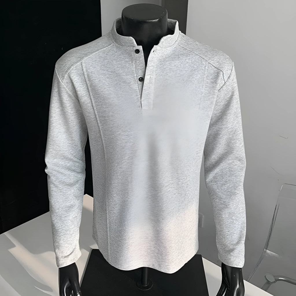 Men's loose-fit long sleeve polo shirt with an asymmetric design and stand-up collar in grey.