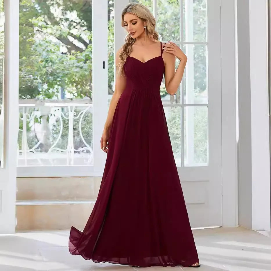 Women's sleeveless A-line maxi dress with long pleating detail in solid colour