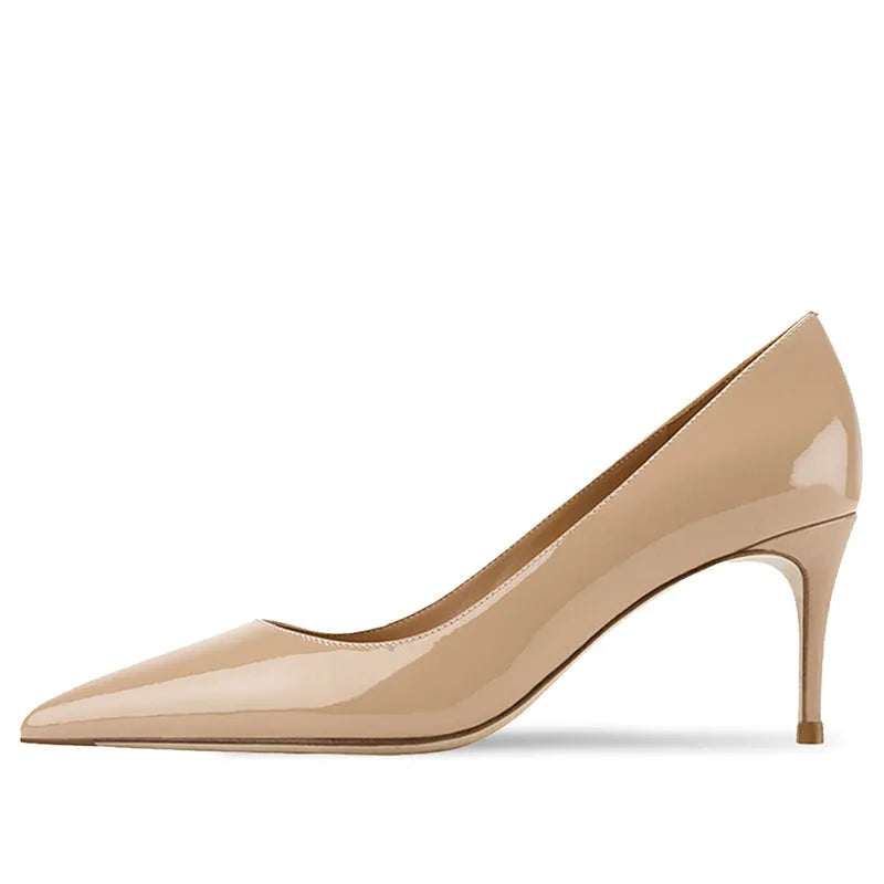 Women's black pointed-toe heeled pump with a soft sole and patent leather upper.