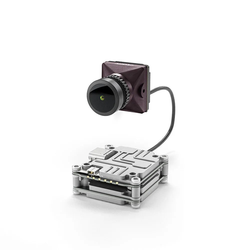 Silver Caddx ADAPTS digital image transmission unit for DJI FPV drones with connection cables and mounting screws.